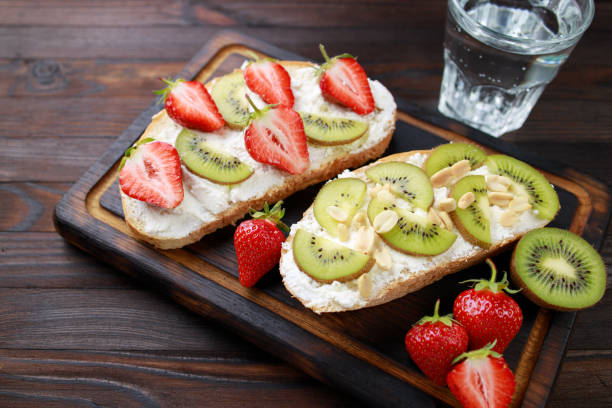 istock Fruit toasts with kiwi, strawberry and ricotta 1247648986