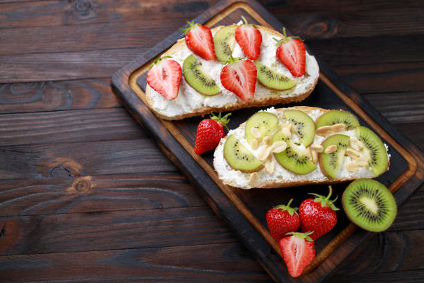 istock Bruschettas with strawberries, ricotta and kiwi 1247648989