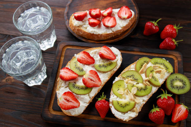 istock Fruit toasts with kiwi, strawberry and ricotta 1247648996