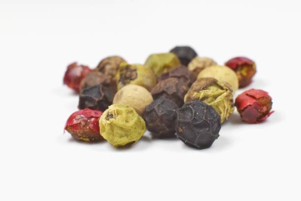 istock Four kind of pepper balls on white background 1247650711