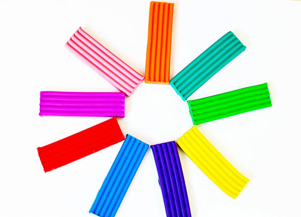 istock Colorful modeling clay, plasticine as a frame over white a white background. toys background. Frame with place for text. Percentage growth graph concept. Finance, business, interest. Bank, payments, credit. 1247652505