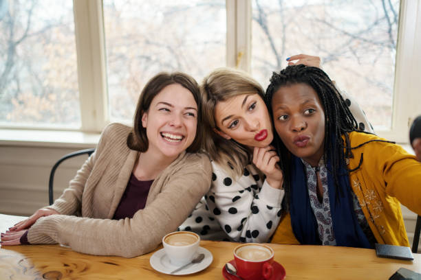 istock Women taking a selfie in a cafe 1247656079