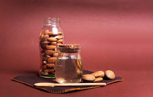 Crunchy almond cookies in portions  Almonds in a ceramic bowl