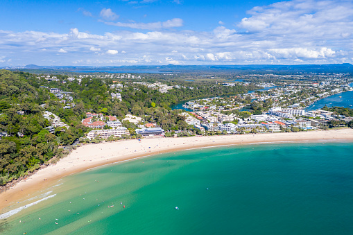 Noosa Heads is a popular Sunshine Coast tourist destination with sunny weather and a beautiful beach.