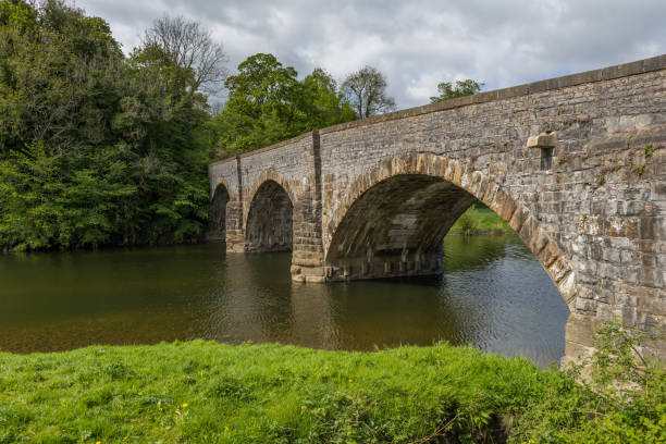 istock Brungerley bridge, Clitheroe. Large stone bridge over the river Ribble 1247668025