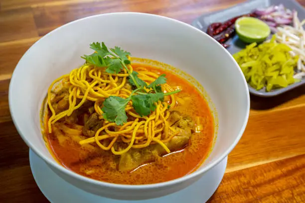 Photo of Khao Soi, Northern Thai curry noodle - famous Thai local traditional recipe