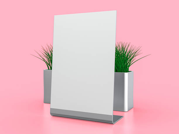 istock Blank paper Table Tent. Mockup on pink background. 3D illustration. 1247682243