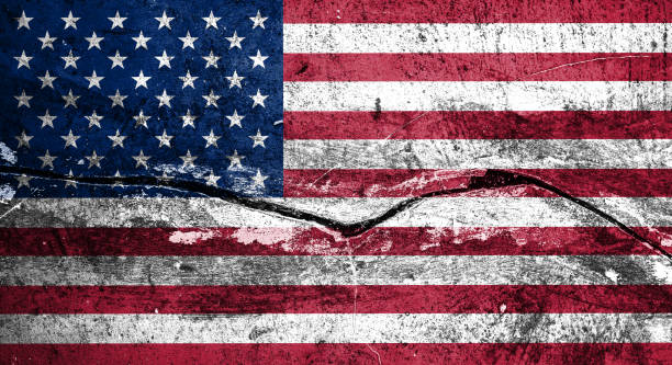 istock Concept American flag on cracked background 1247691120