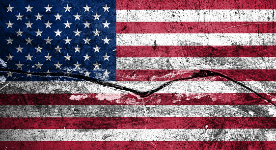 Image of Concept American flag on cracked wall background