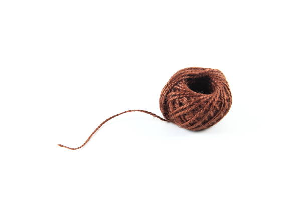 istock A piece of rough flax string on white background 1247694655