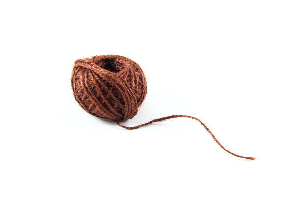 istock A piece of rough flax string on white background 1247695270