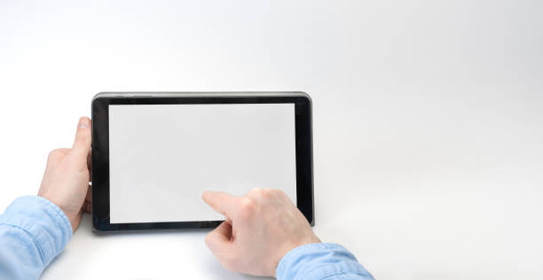 istock Male hands holding digital tablet blank screen horizontally on white background. Take your screen to put on advertising 1247698625