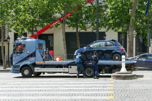 Paris, France. Impounded for illegal parking. 06 June. 2020. An in violation vehicle removed by a tow truck after being verbalized by the police. car boot stock pictures, royalty-free photos & images