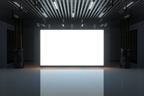 The glowing blank wall in the large showroom. 3d rendering.