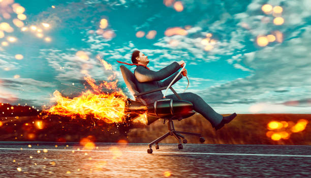 企業家拉起他的新專案,這是一個火箭燃料的辦公椅 - 起飛 活動 個照片及圖片檔