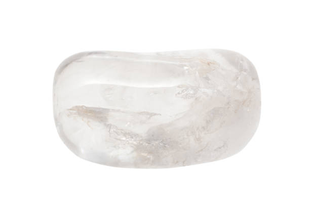 istock rolled colorless Rock crystal gemstone isolated 1247731360