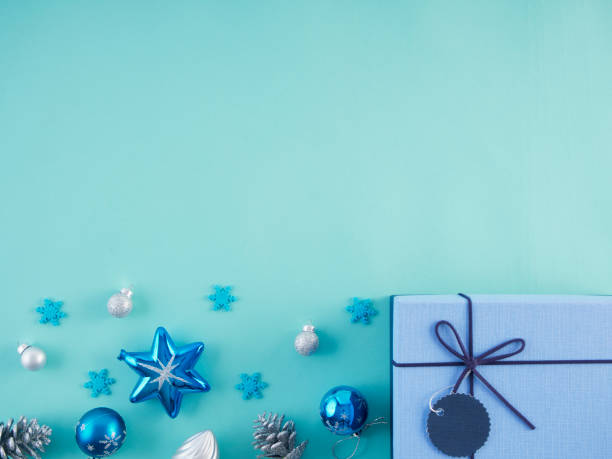 istock Gifts and christmas decorations on pastel blue background. 1247733502