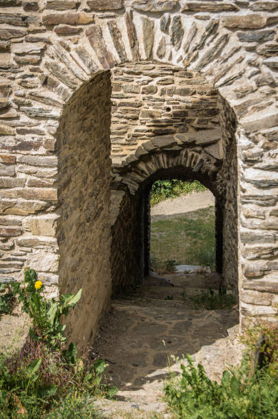 istock Gateway through the wall of a medieval castle ruin. 1247735205