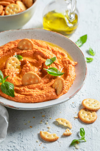 istock Delicious tomato hummus as healthy and quick snack 1247735392