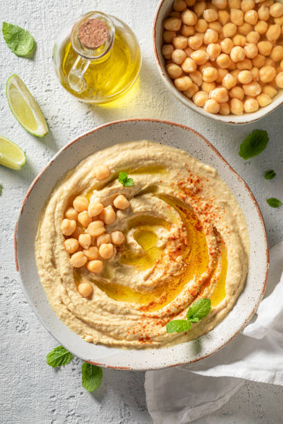 istock Homemade hummus with mint leaves and lime 1247736039