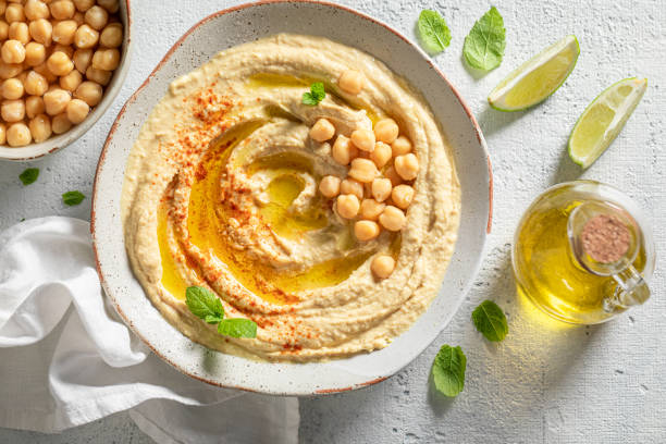 istock Enjoy your hummus with mint leaves and lime 1247736053