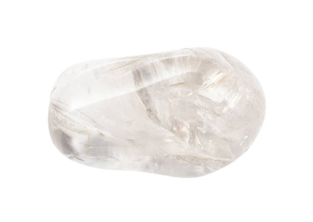 istock rolled colorless Rock crystal gem stone isolated 1247736447