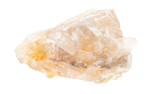 istock rough yellow Fluorite (fluorspar) rock isolated 1247736456
