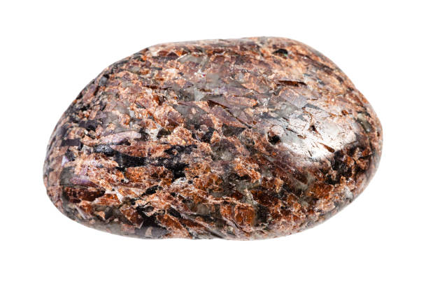 istock tumbled Titanite (Sphene) stone isolated on white 1247745796