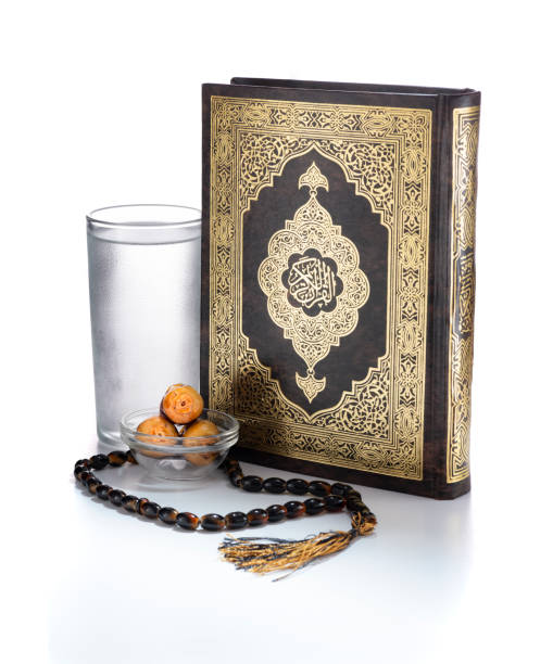 istock Ramadan Items, Quran Holy Book, Water, Dates and Rosary 1247752864