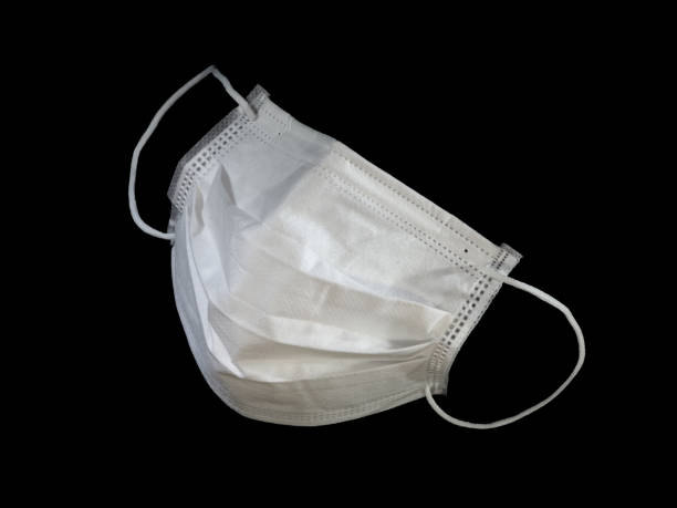 istock Mask to protect against corona(COVID-19) virus (black background) 1247759156