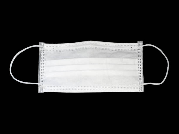 istock Mask to protect against corona(COVID-19) virus (black background) 1247759157