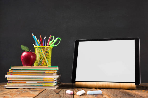 istock Back to School Concept. Stationery Supplies And Digital Tablet With White Empty Screen. Available Copy Spaces For Creative Campaign Design. 1247764323