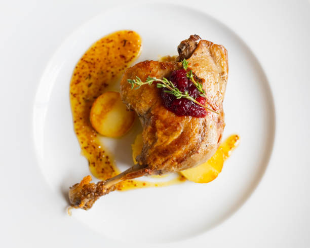 istock roasted duck leg with potato and mustard sauce 1247773218