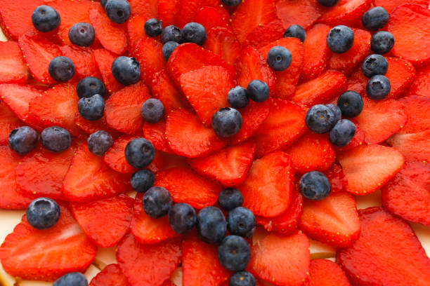 istock cheesecake with strawberries and blueberries 1247773465