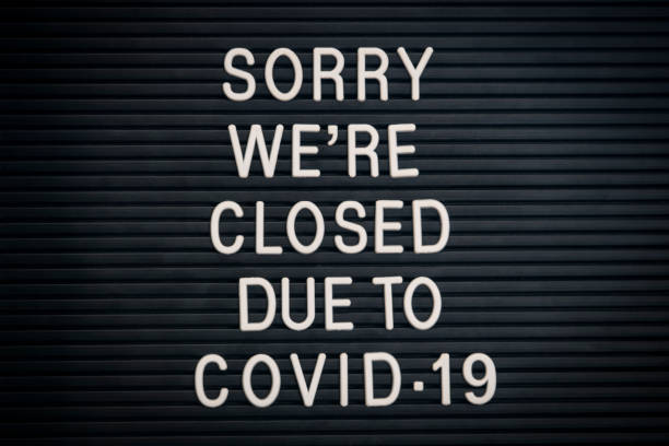istock Sorry we`re closed due to COVID-19 - Marquee sign (click for more) 1247773546