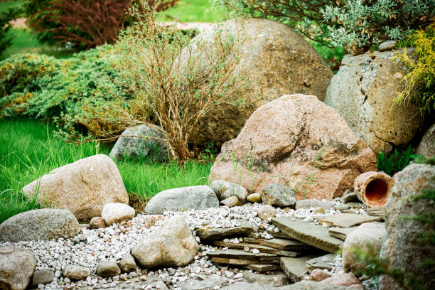 istock Beautiful garden with trees, lawn with green grass 1247787090