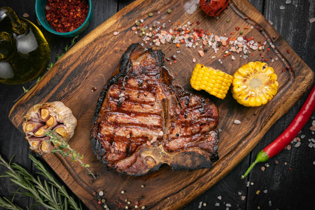 istock BBQ dry aged Steak sliced T-bone steak 1247791573
