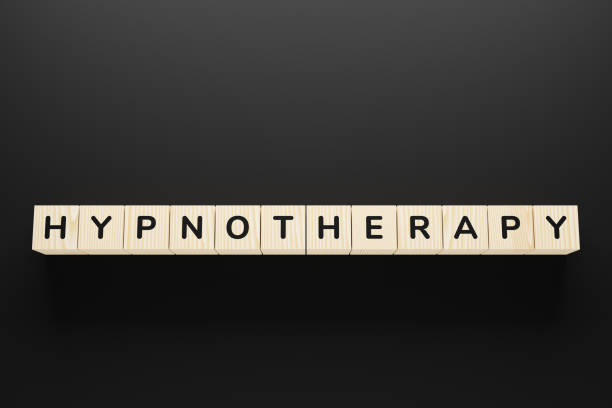 hypnotherapy word on a wooden blocks. - hypnotist therapy alternative therapy alternative medicine imagens e fotografias de stock