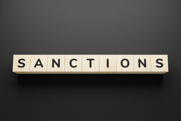 istock Sanctions word on a wooden blocks. 1247794898