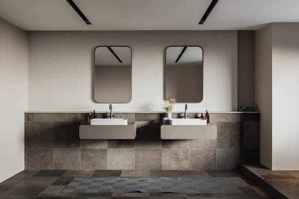 istock Beige and tiled bathroom with double sink 1247798314