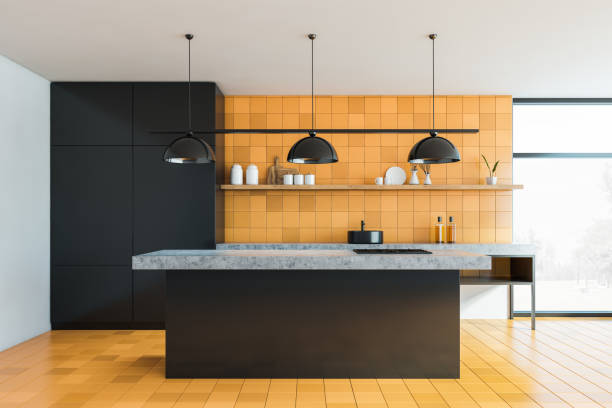 istock Yellow tile and black kitchen with island 1247798394