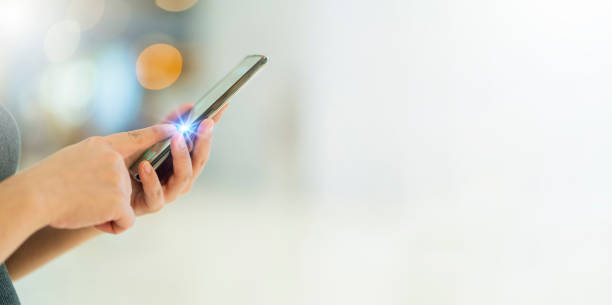 istock closeup hand press functional smartphone technology communication with abstract blur bokeh background 1247798623