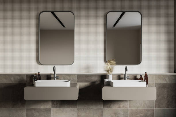 istock Beige and tile bathroom with double sink, close up 1247798713