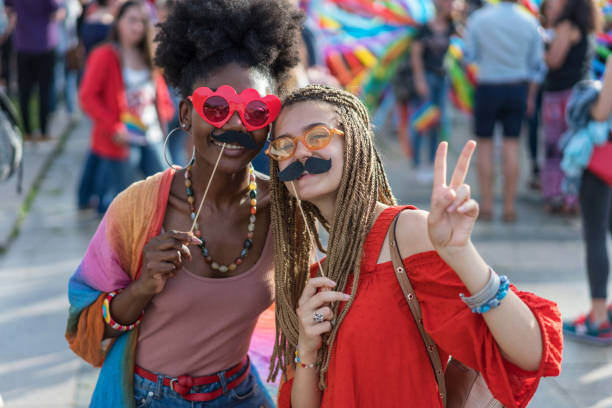 istock Women having fun at the pride parade 1247798820