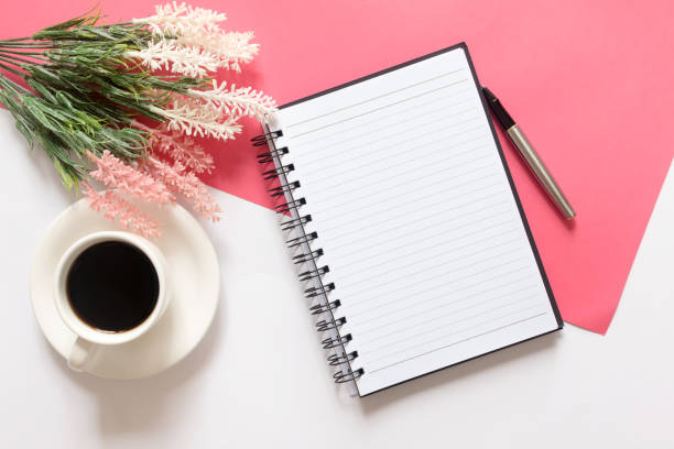 blank notebook, coffee and flower bouquet - isolated on white breakfast cafe office imagens e fotografias de stock