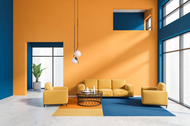istock Orange and blue living room interior 1247800414