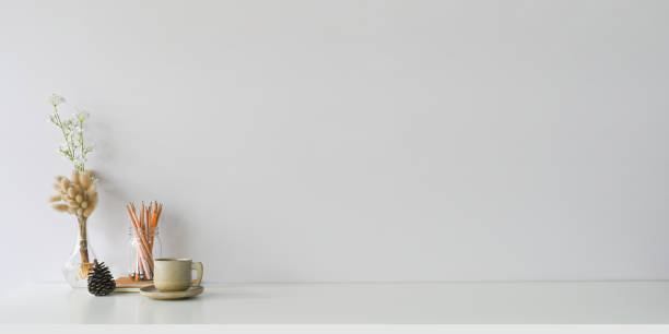 istock Comfortable workspace is surrounding by a ceramic coffee cup and accessories. 1247808219