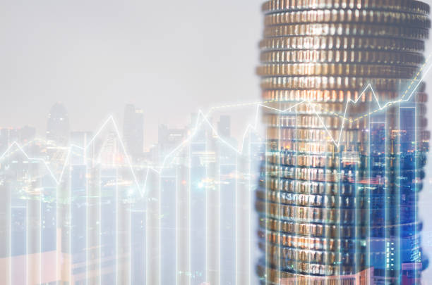 istock double exposure of city with row of coin stack with growth chart and graph progress report for business investment finance banking and money saving concept. 1247809500