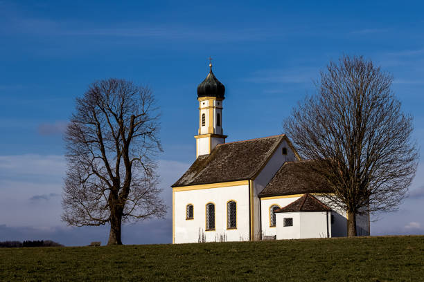 istock small chapel  against a blue sky in upper bavaria 1247811756