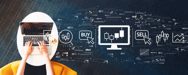 istock Stock trading theme with person using a laptop 1247812164